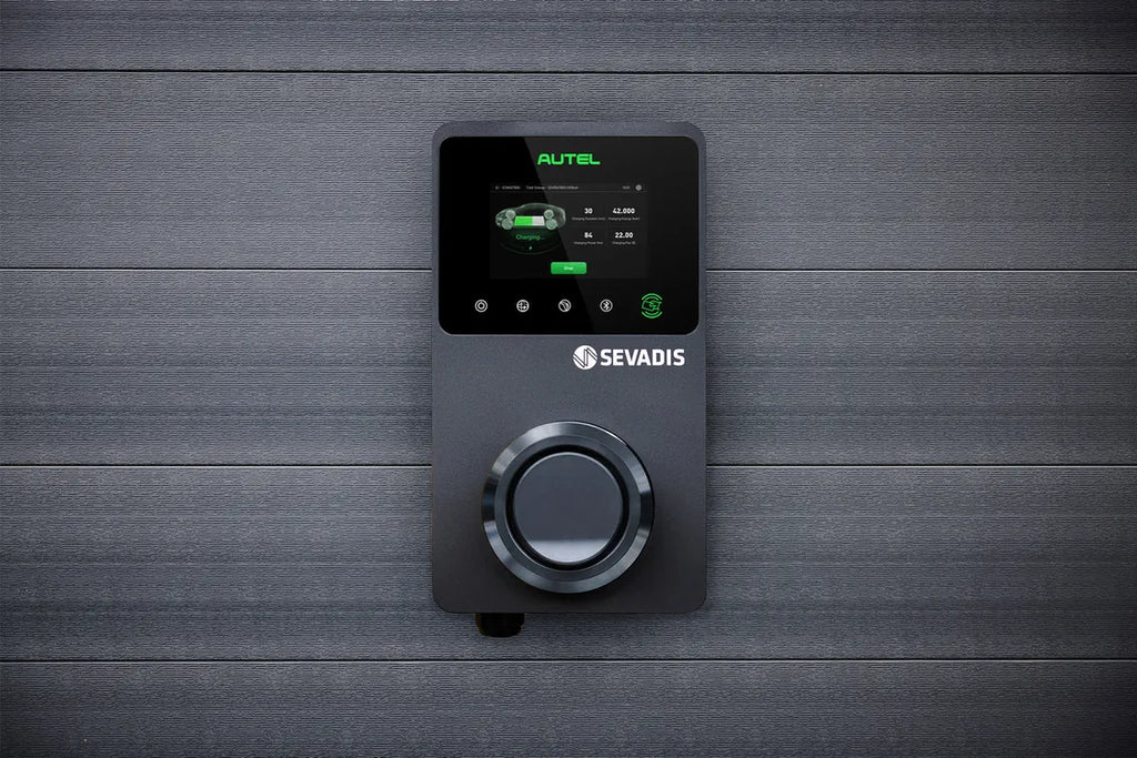 Autel MaxiCharger EV charger mounted on wood panel wall, SEVADIS display showing active charging session - UK home charging point