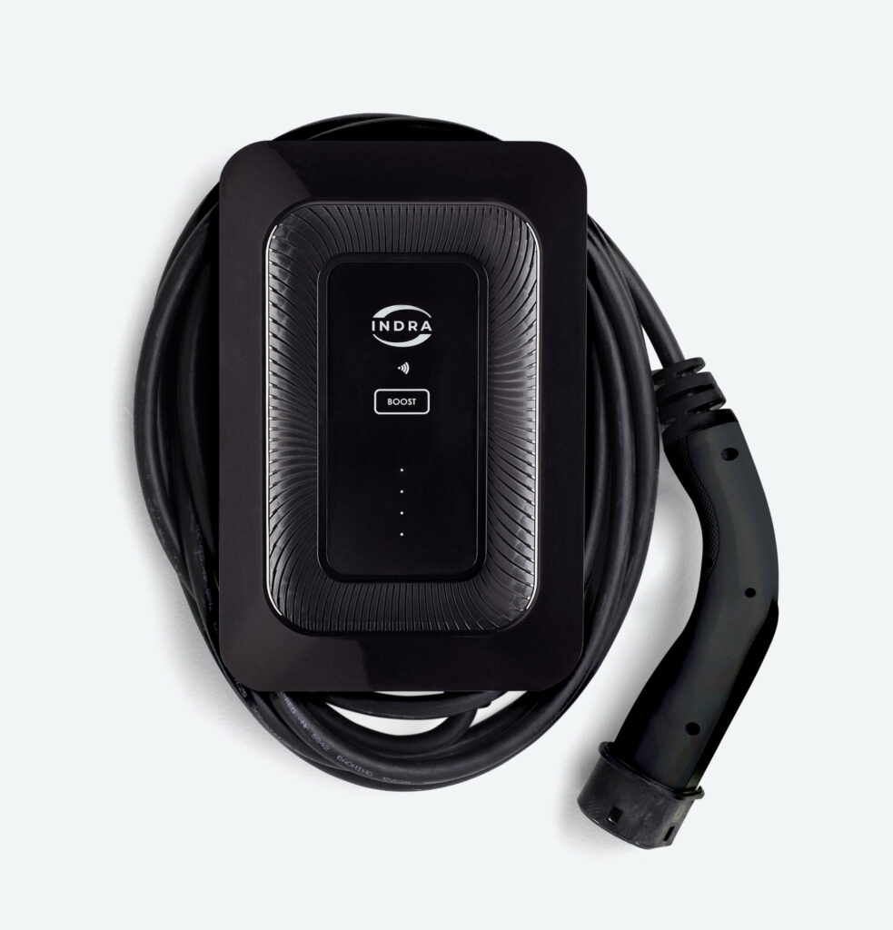 Indra Smart LUX tethered home EV charger in black with sunburst-textured front, INDRA logo, BOOST button and full Type 2 cable coiled around the unit